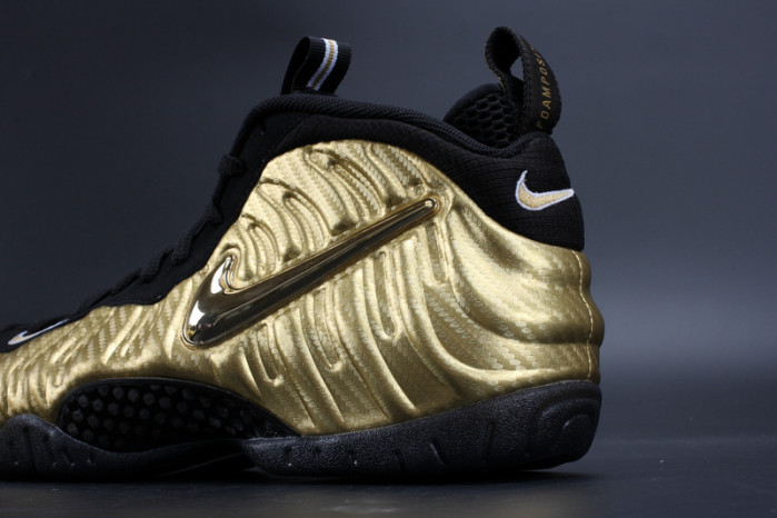 air foamposite pro “metallic gold” black mens 624041-701